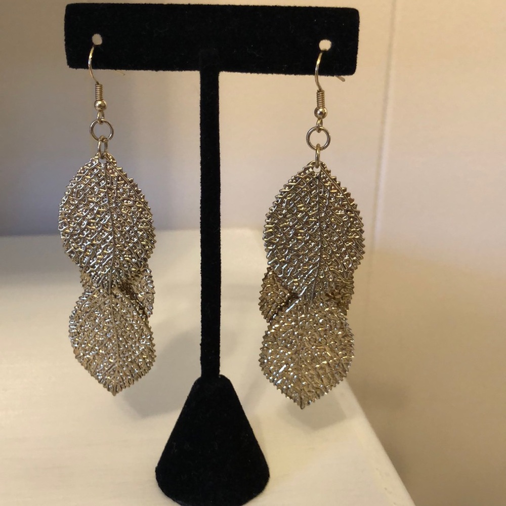 Gold leaf earrings.